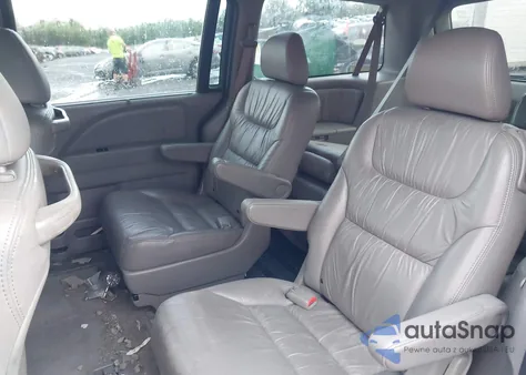 2010 Honda Odyssey Exl z USA, uszkodzony, nr VIN 5FNRL3H78AB015933